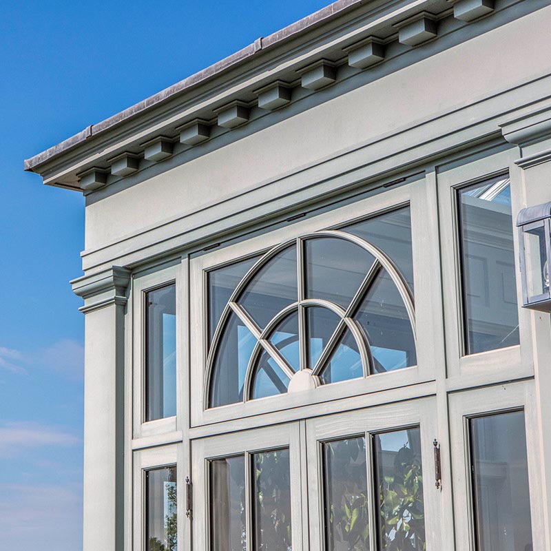 Decorative fanlight detail and dentil moulding