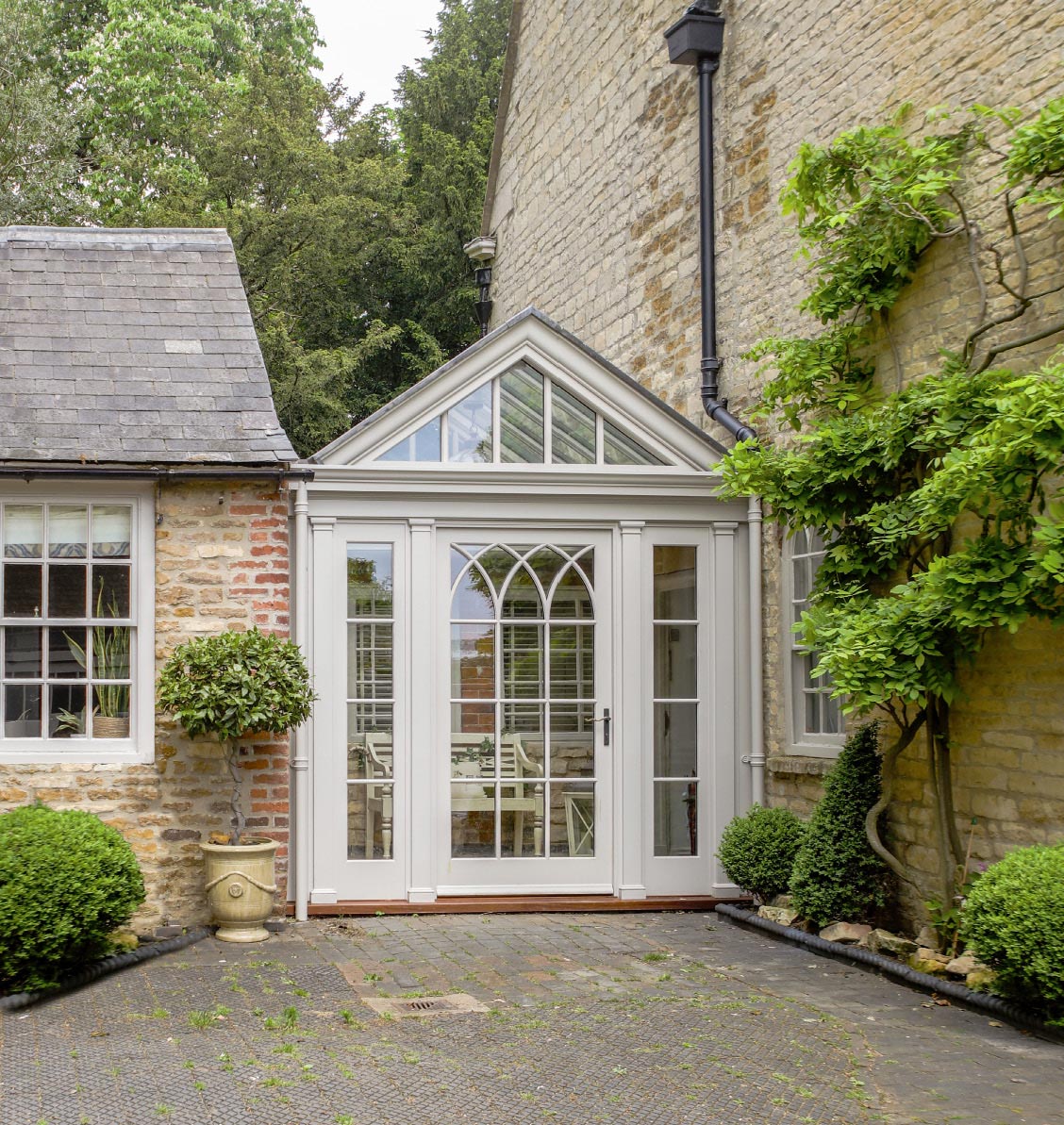Example of a small conservatory used as an entrance hall