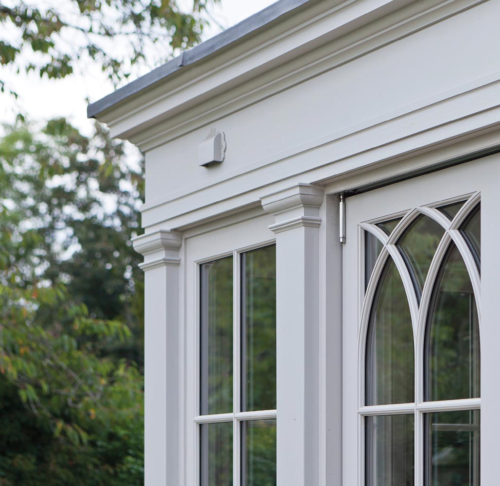 Close up view of column and window details on an orangery