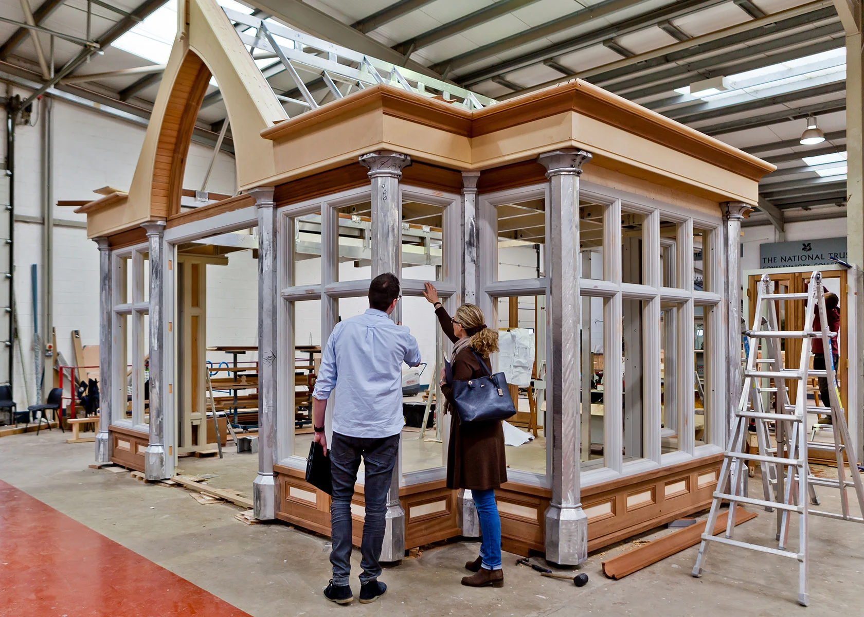 Bespoke conservatory construction showcasing traditional craftsmanship and architectural detailing