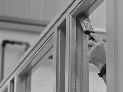 Conservatory being painted at Vale Garden Houses